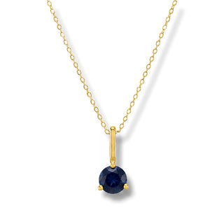 Colar Sign ponto de luz Safira Midnight banhado a ouro 18K da UNA em fundo branco, com azul profundo