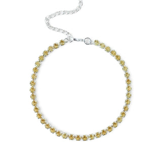 Pulseira riviera amarela banhada a prata 925 da UNA Semijoias em fundo branco, com fileira de pedras amarelas em destaque em formato circular.