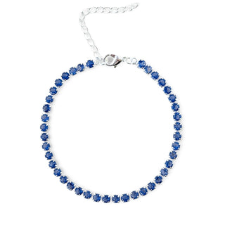 Pulseira riviera azul banhada a prata 925 da UNA Semijoias em fundo branco, semijoia atemporal com zircônias azuis delicadas, ideal para mulheres luxuosas.